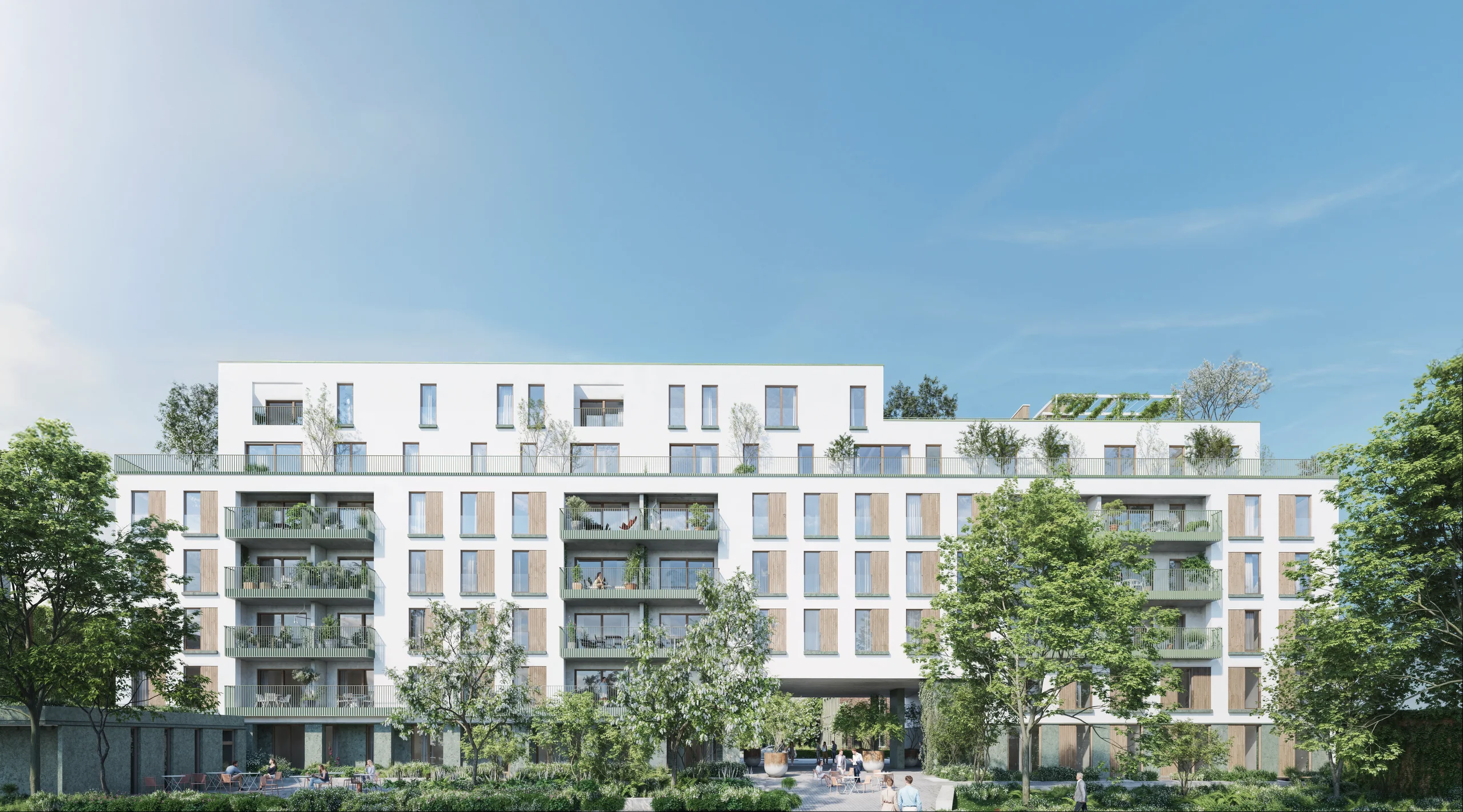 Gevel van Mandelhof met terrassen boven de groene binnentuin